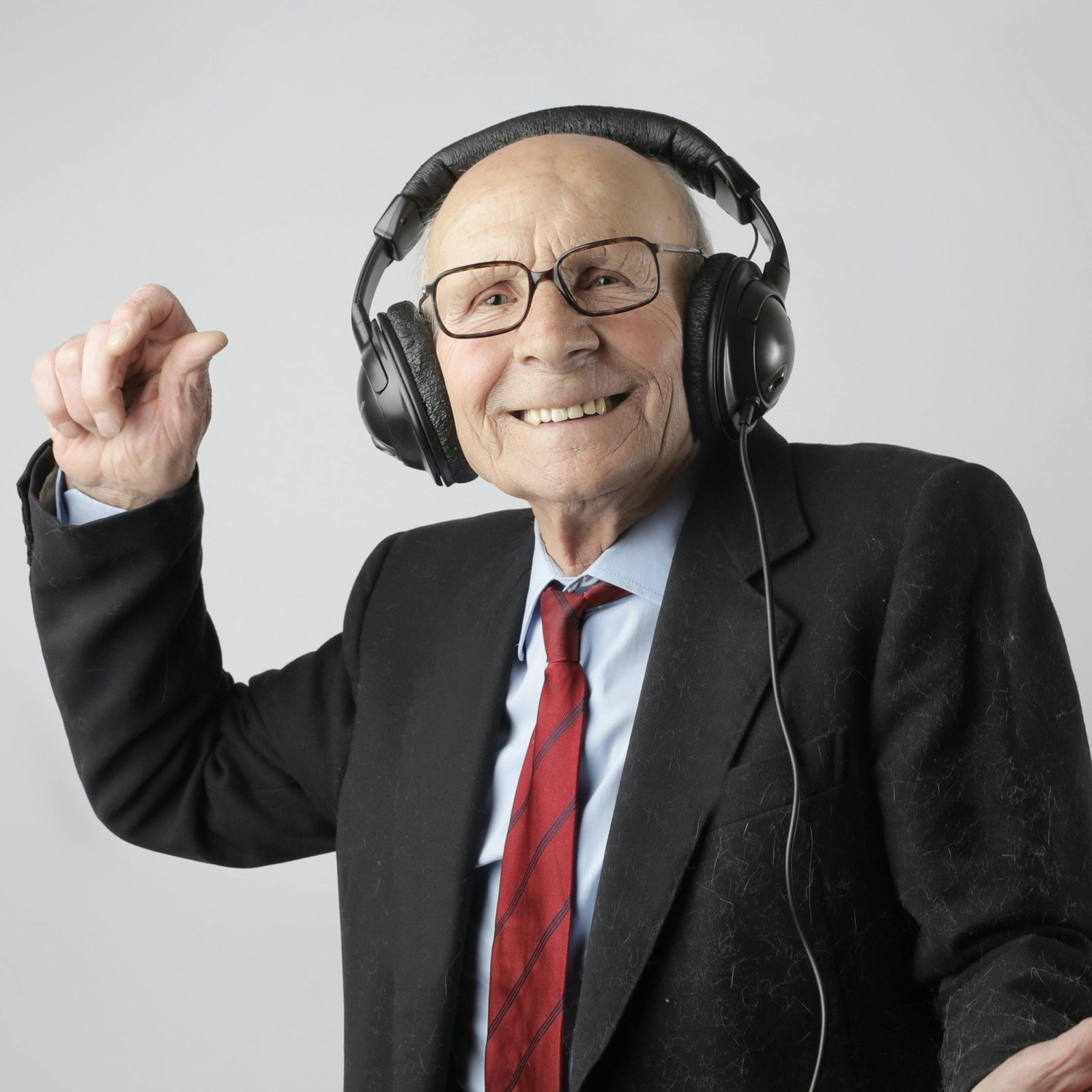 old man with headphones